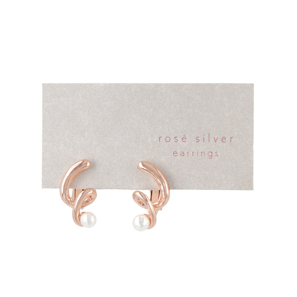 Spirale rosée et perle, en boucles